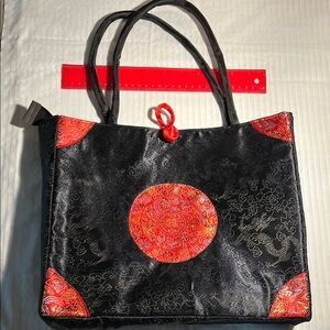 Black and Red Glossy Tote with Bold Accents